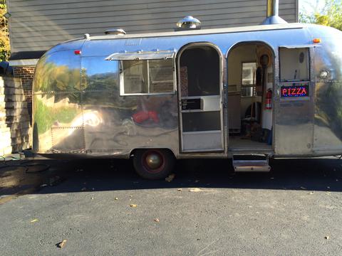 Photo of side of Airstream parked in the Fiorito&#039;s driveway